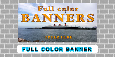 image of a full color banner on a brick wall